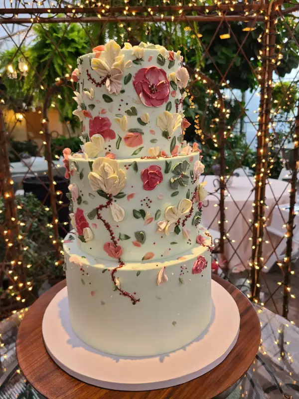 Elegant custom cake styled on site at a Utah venue