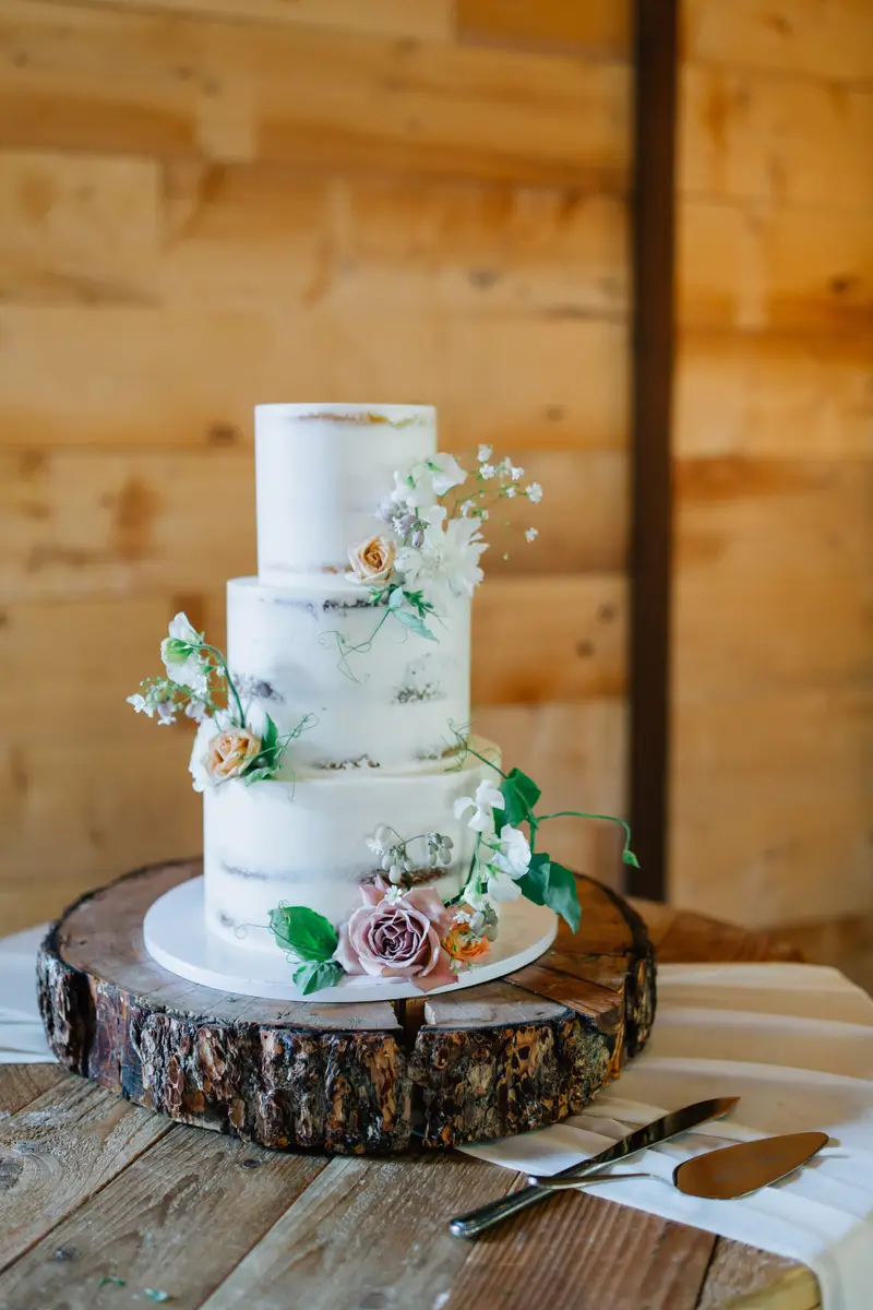 Buttercream wedding cake with florals by Sweet E's