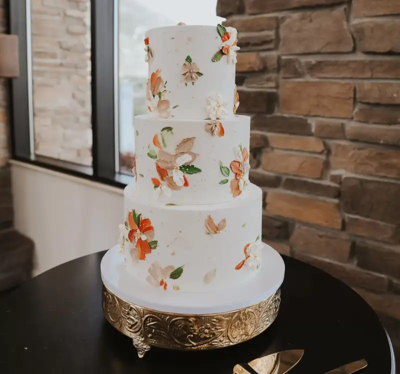 Elegant custom cake styled on site at a Utah venue