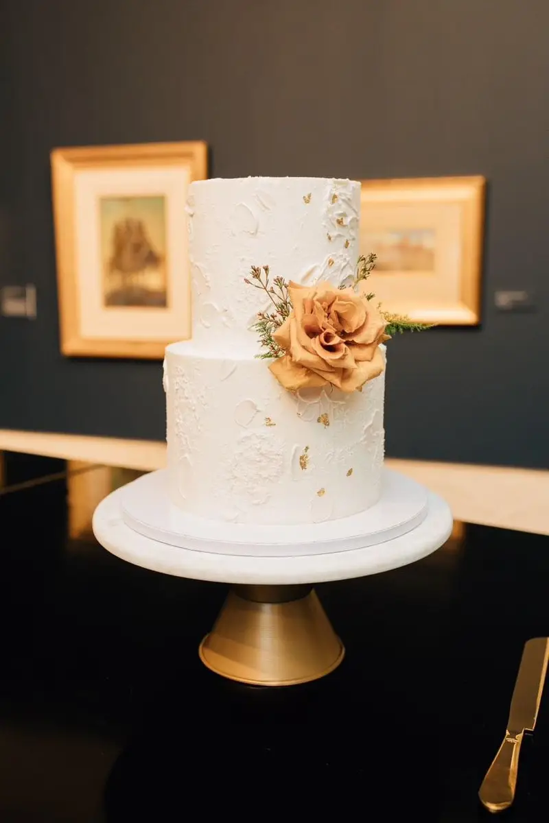 Elegant custom cake styled on site at a Utah venue