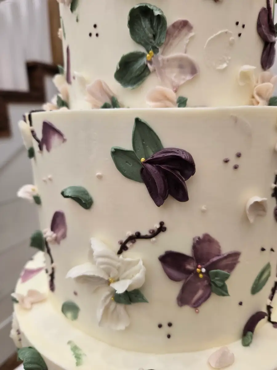 Buttercream wedding cake with florals by Sweet E's