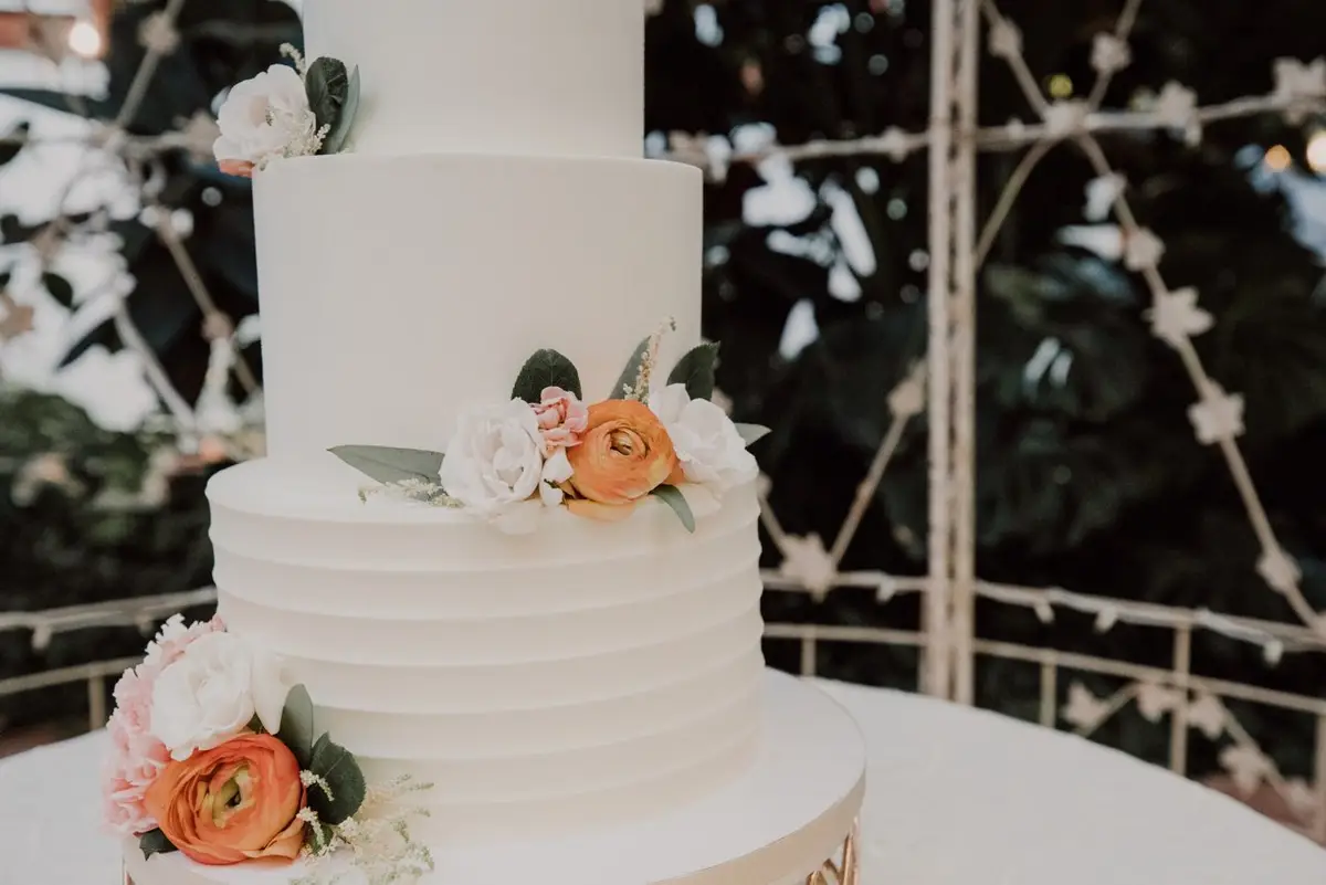 Buttercream wedding cake with florals by Sweet E's