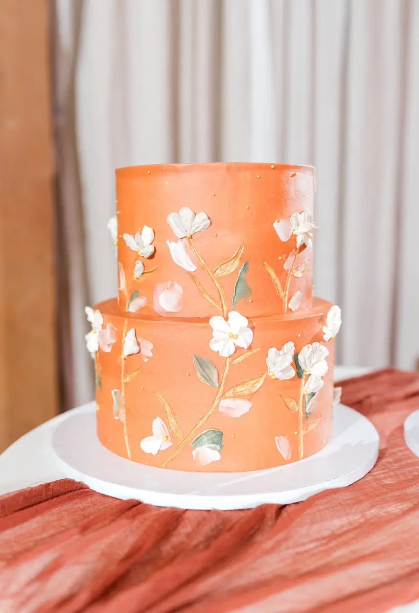 Buttercream wedding cake with florals by Sweet E's